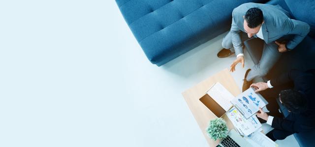 Top view, two businessmen sitting in the office talking about marketing strategy planning